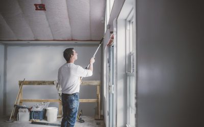 Painter decorator working inside building